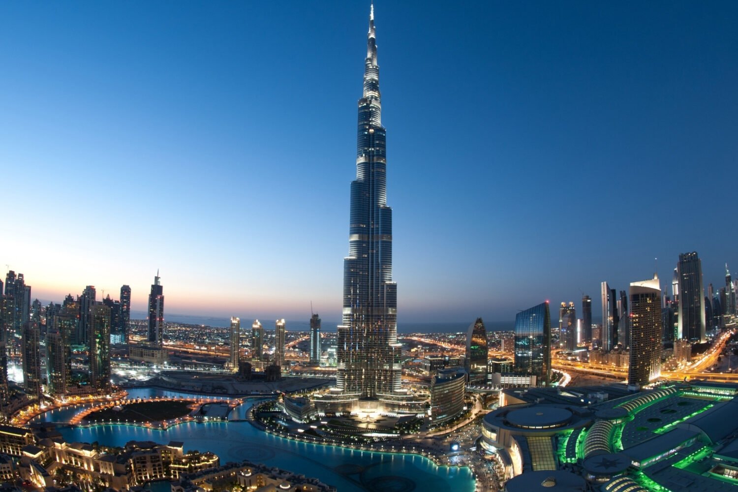 Dubai 8 Days Adventure Tour Package with dhow cruise, desert safari, Yas Island, Ferrari World, Aquaventure Waterpark, Miracle Garden, Global Village, Dubai Mall & Burj Khalifa