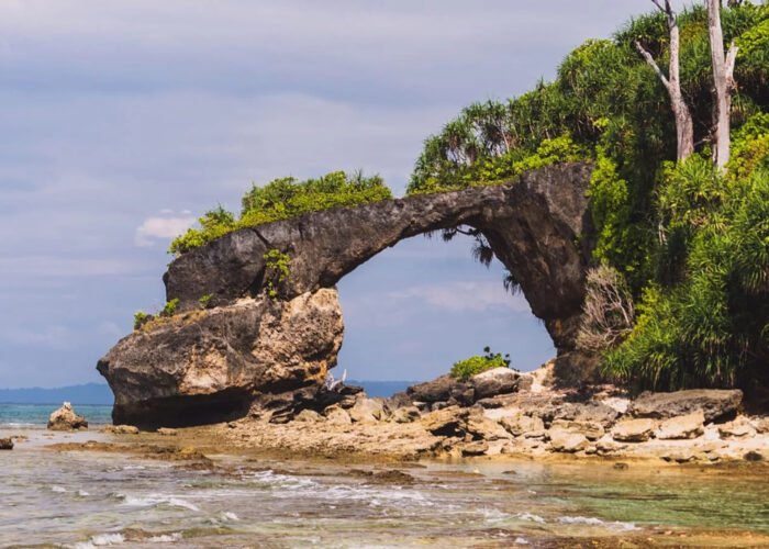 Adventurous Andaman 8 Days tour package – turquoise beaches, lush forests, Neil & Havelock Islands, Radhanagar Beach, Limestone Caves, and marine life exploration in a tropical island paradise