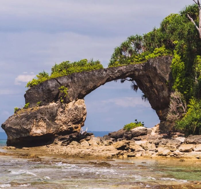 Adventurous Andaman 8 Days tour package – turquoise beaches, lush forests, Neil & Havelock Islands, Radhanagar Beach, Limestone Caves, and marine life exploration in a tropical island paradise