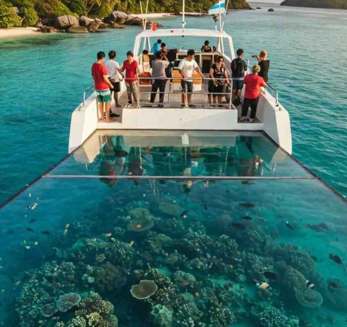 Group tour of Andaman Islands 5 days – travelers exploring Corbyn’s Cove Beach, Ross Island ruins, snorkeling at North Bay, relaxing at Radhanagar Beach, and visiting Baratang Limestone Caves amidst lush mangroves