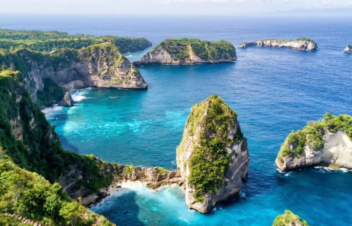 Broken Beach cove with rocky arch in Nusa Penida