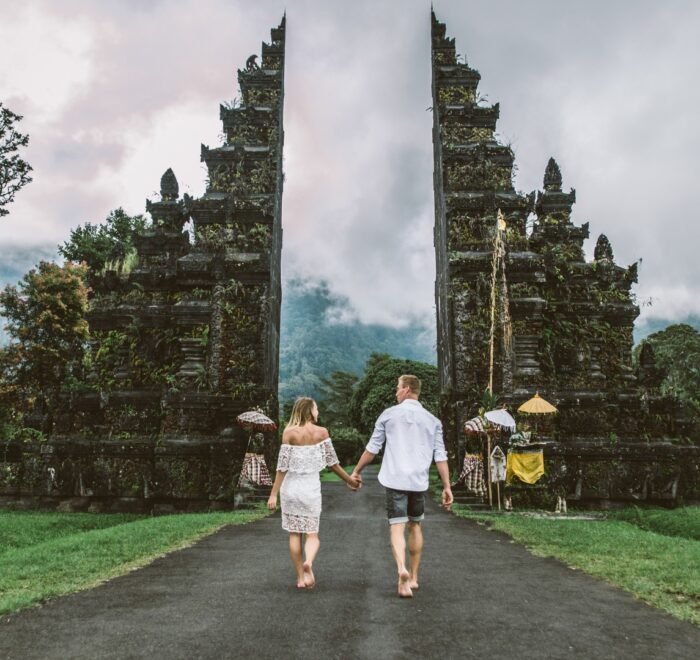 7 Days Bali itinerary with Ubud temples, Kintamani Mount Batur, Gitgit Waterfalls, Tanah Lot sunset, Tanjung Benoa water sports, Nusa Penida Island, and Bounty Sunset Dinner Cruise.